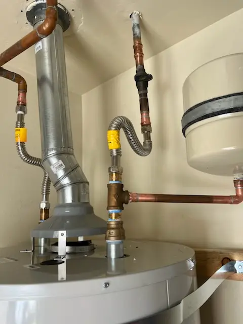 Water heater installation and plumbing repair in Flax Hill